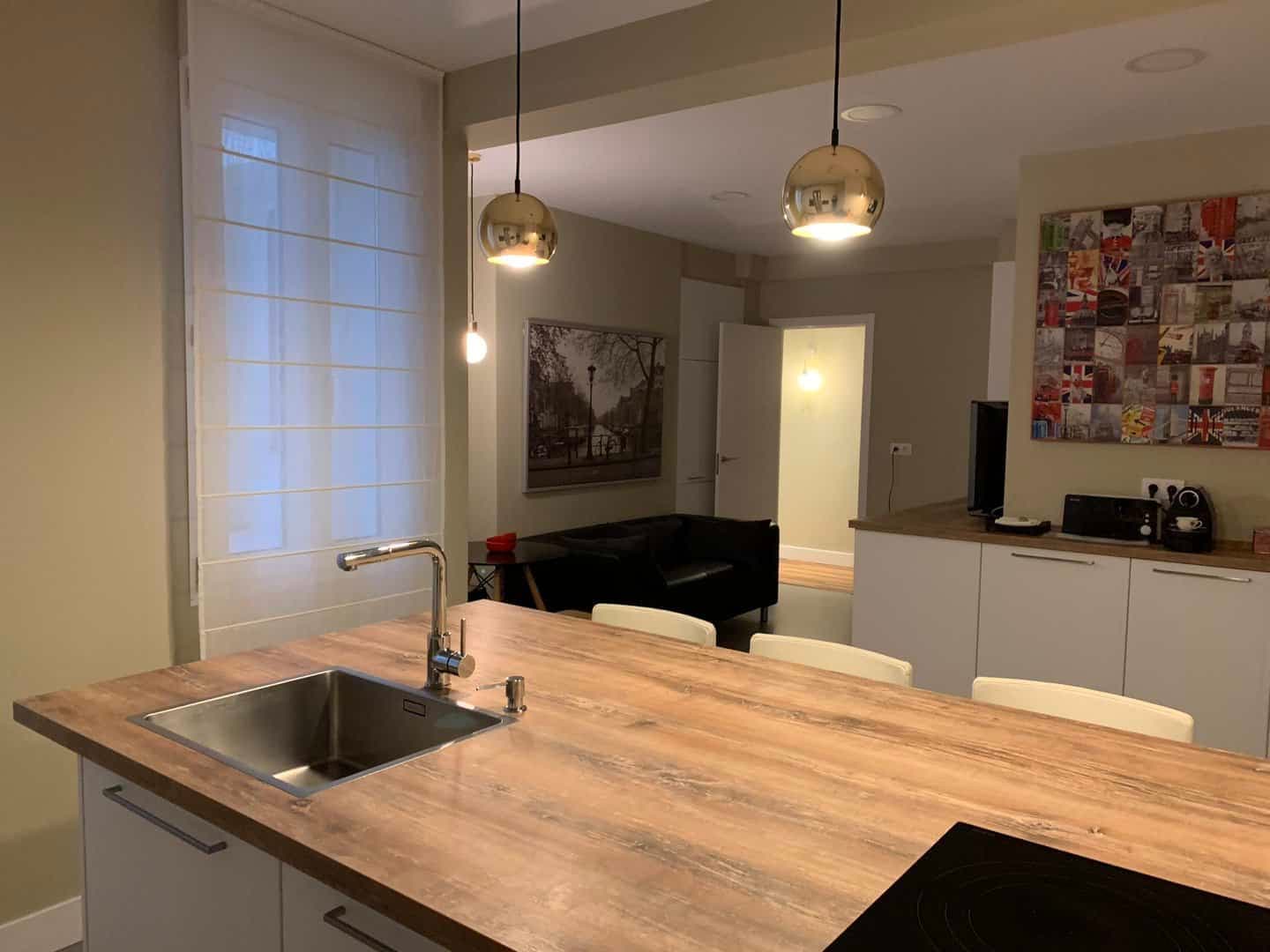Cocina con zona de estar integrada · vista 7