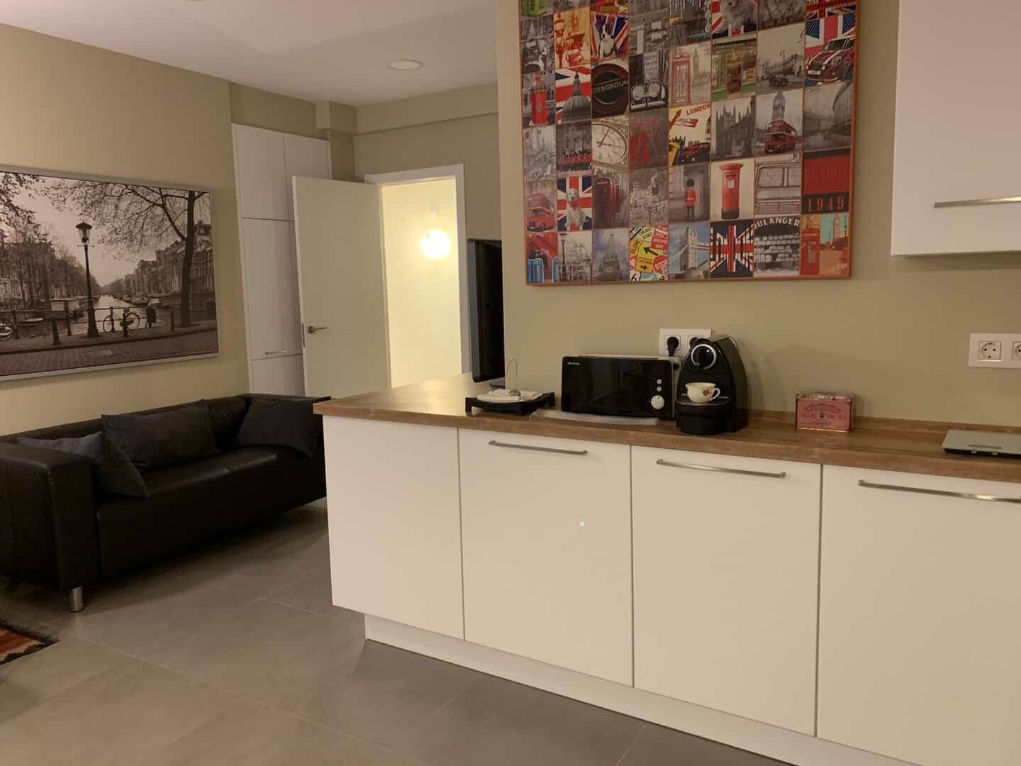 Cocina con zona de estar integrada · vista 9